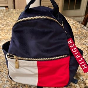 Tommy Hilfiger backpack like new once again worn very lightly !